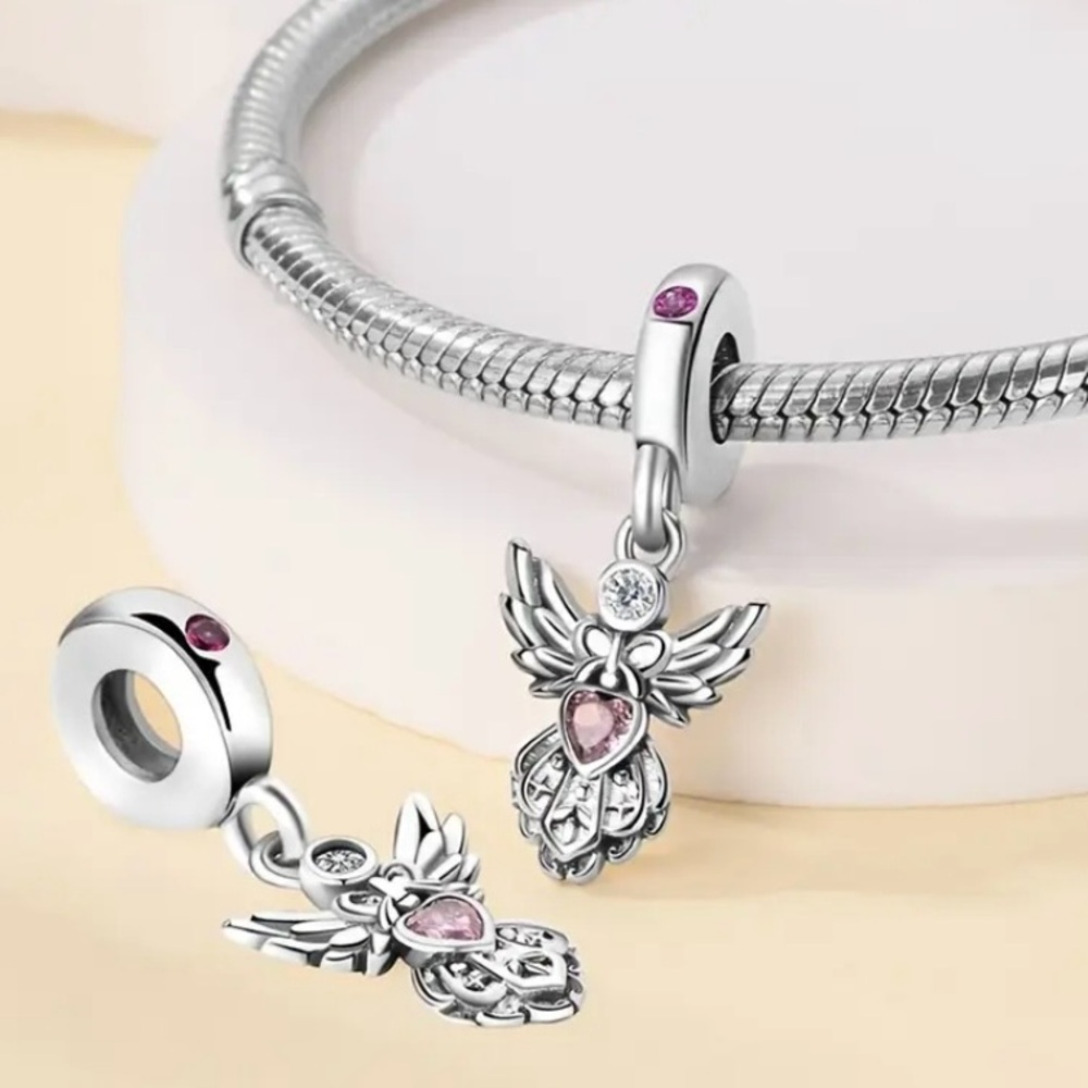 Sterling Silver Angel Charm Pendant with a Pink Gemstone Heart - Picture 7 of 11